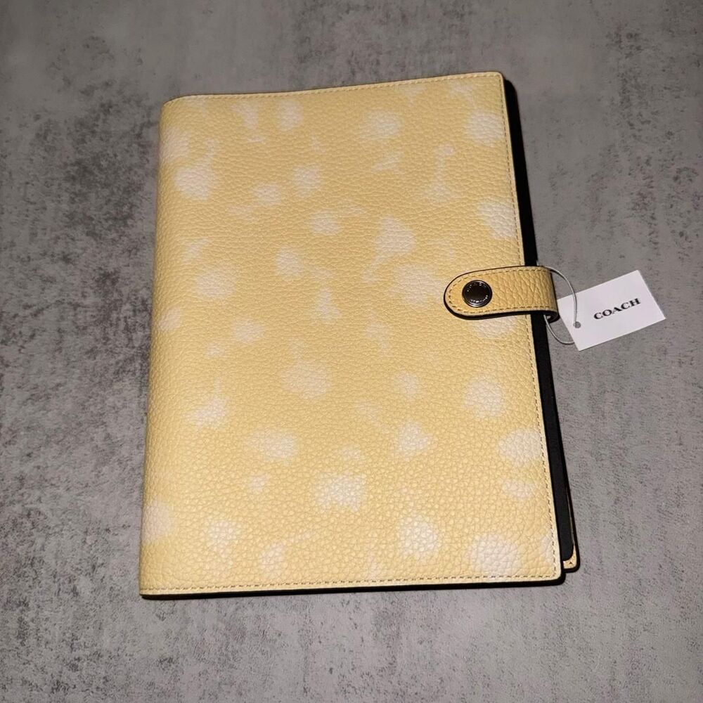 Coach yellow floral print leather notebook